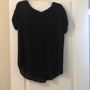 Short sleeved blouse with accordion pleat back